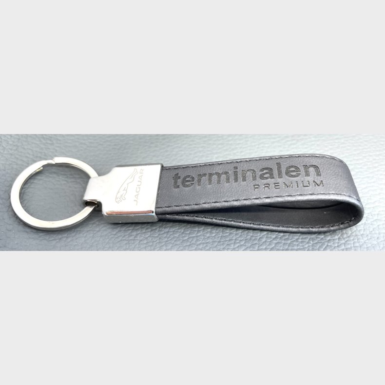Lder/Metal nglering med logo/tekst p bde metalhovedet og lderet