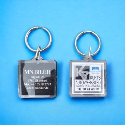  Acryln�glering 39 x 39 mm med eget logo og tekst p� begge sider